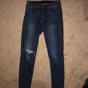 Just black slightly ripped skinny jeans